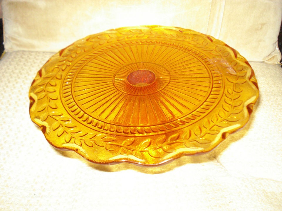 AMBER DEPRESSION GLASS CAKE PLATE FOOTED WITH HOLLY DESIGN  