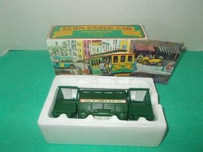 VINTAGE AVON CABLE CAR BOTTLE WITH WILD COUNTRY AFTERSHAVE. 4 OZ NIB
