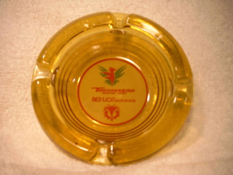 amber glass ashtray round thunderbird red lion