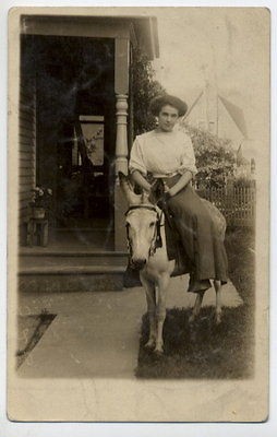 P1200 WOMAN DONKEY SIDE SADDLE RPPC