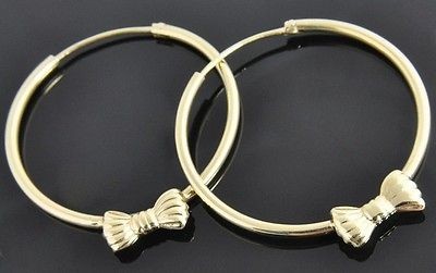   14K Yellow Gold Bow Tie Ribbon Round 1.5 Continuous Hoop Earrings