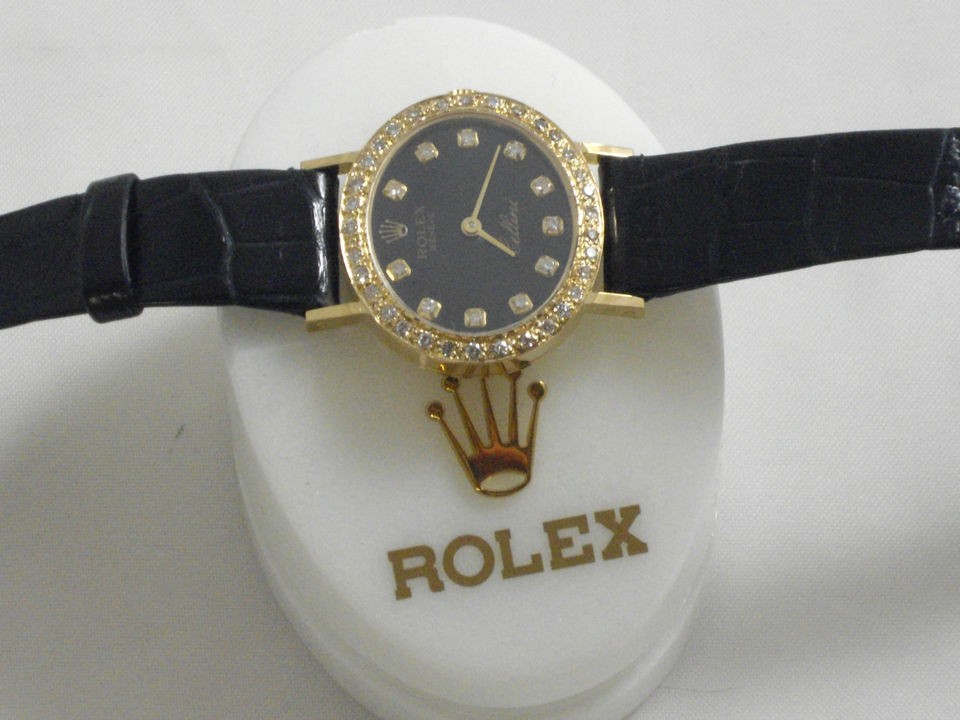 rolex ladies cellini soild 18kt. yellow gold w/diamond bezel w/box 