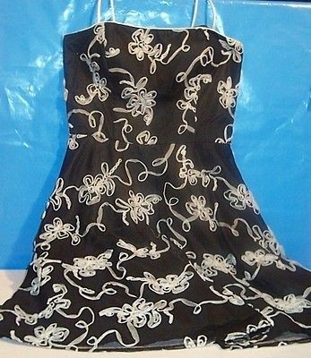 Womens dress by Masquerade, acetate, black w/ beige floral design 