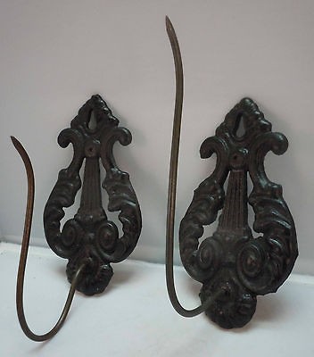 pair of antique black cast iron wall paper receipt spikes