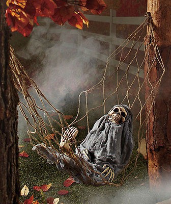 new halloween sound activated skeleton in a hammock outdoor yard