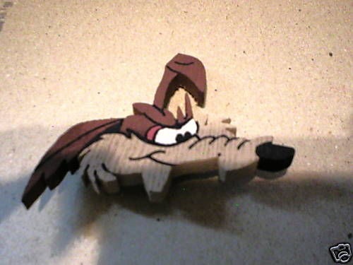 wylie coyote look a like cartoon character pin time left