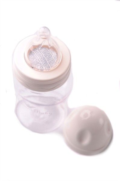 armani baby feeding bottle with a cream cap and eagle brand design 