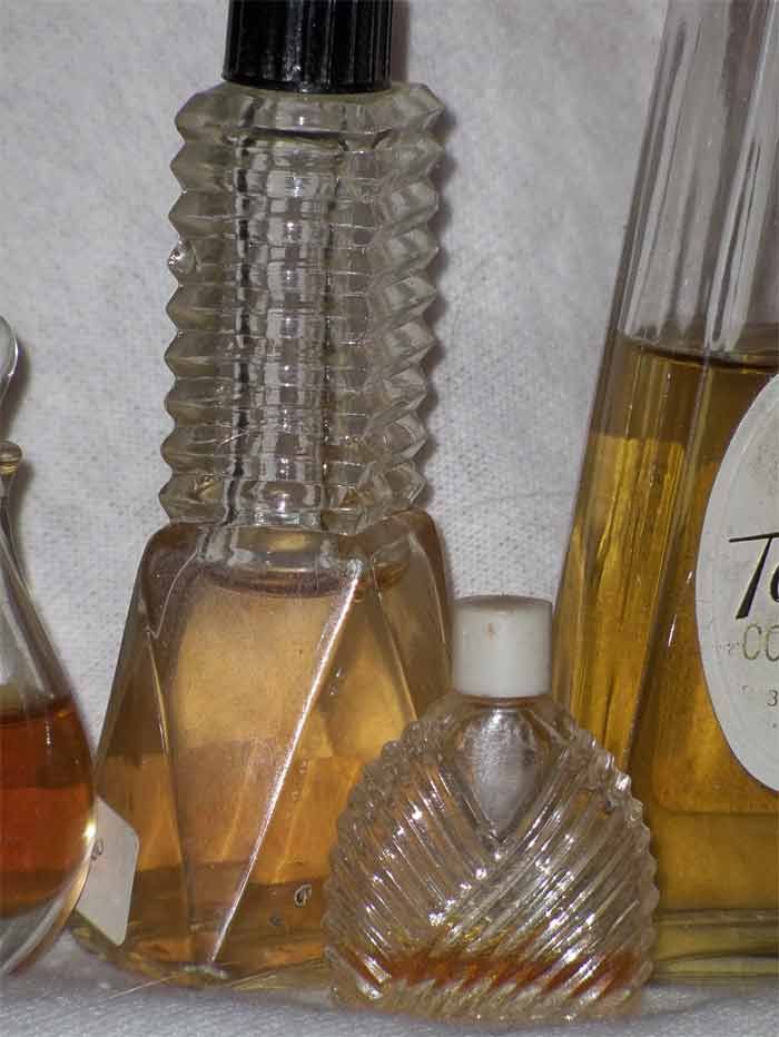   add their vintage perfume display all from the same estate collection