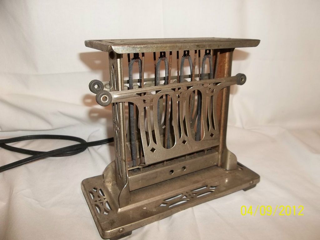 antique original universal toaster chrome model e944 