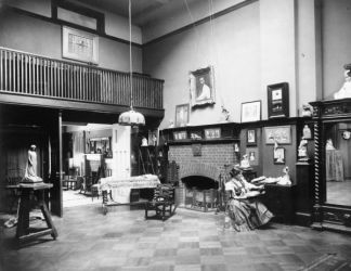   and painting displayed. Bessie Potter Vonnoh seated in her studio