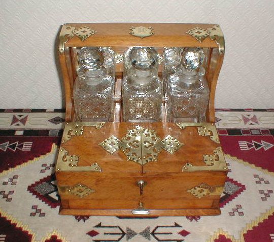 IMPRESSIVE ANTIQUE TANTALUS 3 DECANTER & GAMES SECTION GOTHIC BRASS 