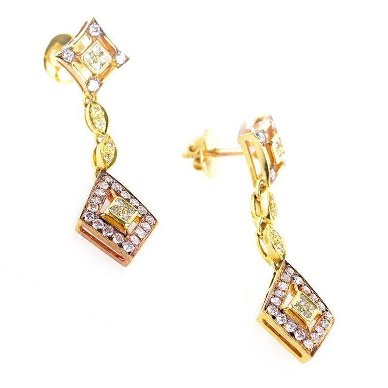 pair of drop earrings are unique and shine with diamonds. The earrings