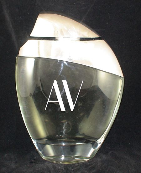  12 inch tall factice av perfume bottle there is a sticker on the