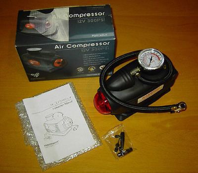 NIB Portable Air Compressor Inflator 12V 300PSI Tire Rafts Balls Toys