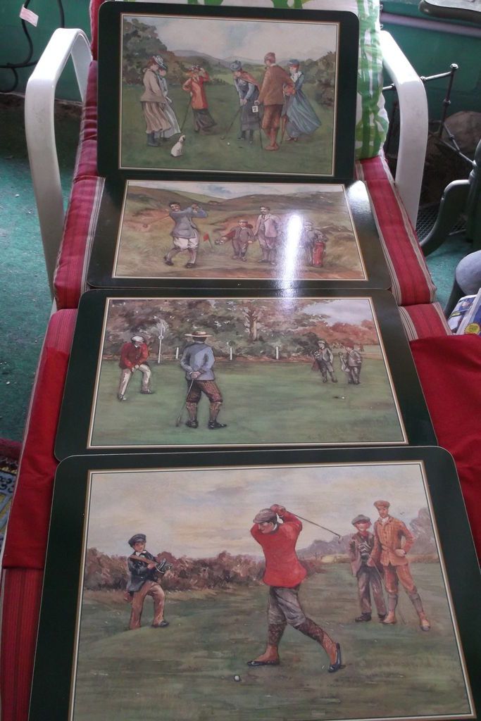 FOUR PLACEMATS WITH OLD GOLF SCENES CORK BACK