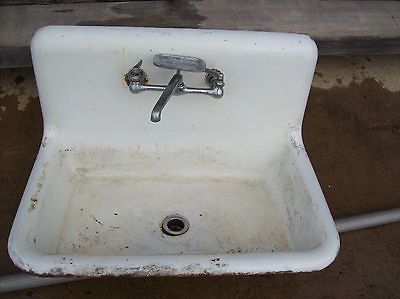 Shallow cast iron sink high back splash