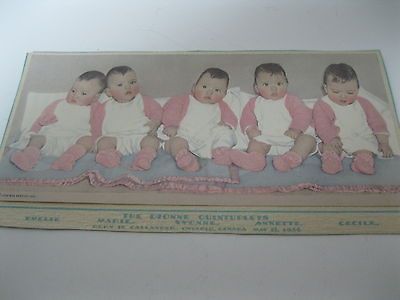 1935 DIONNE QUINTUPLETS CALENDAR TOPPER W/ 1934 FACT SHEET BROWN