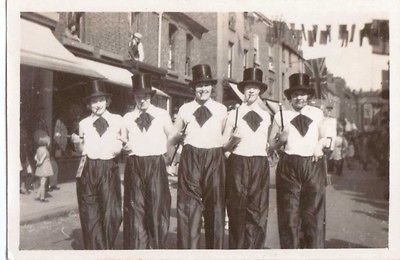 LADIES IN TOP HATS & CANES   CLOWN STYLE COSTUME   CARNIVAL? OLD